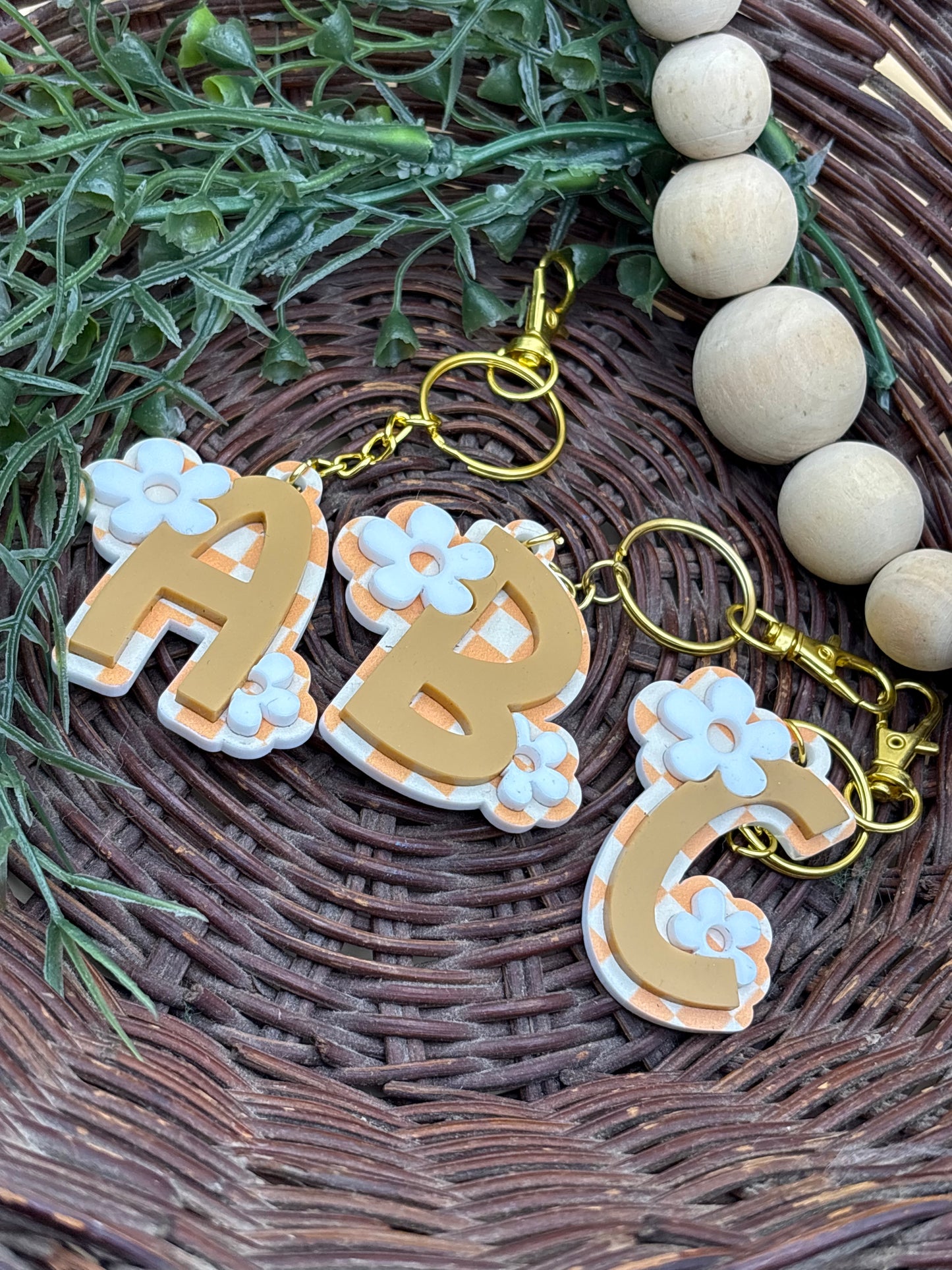 Retro Groovy Checkered And Floral Initial Keychains