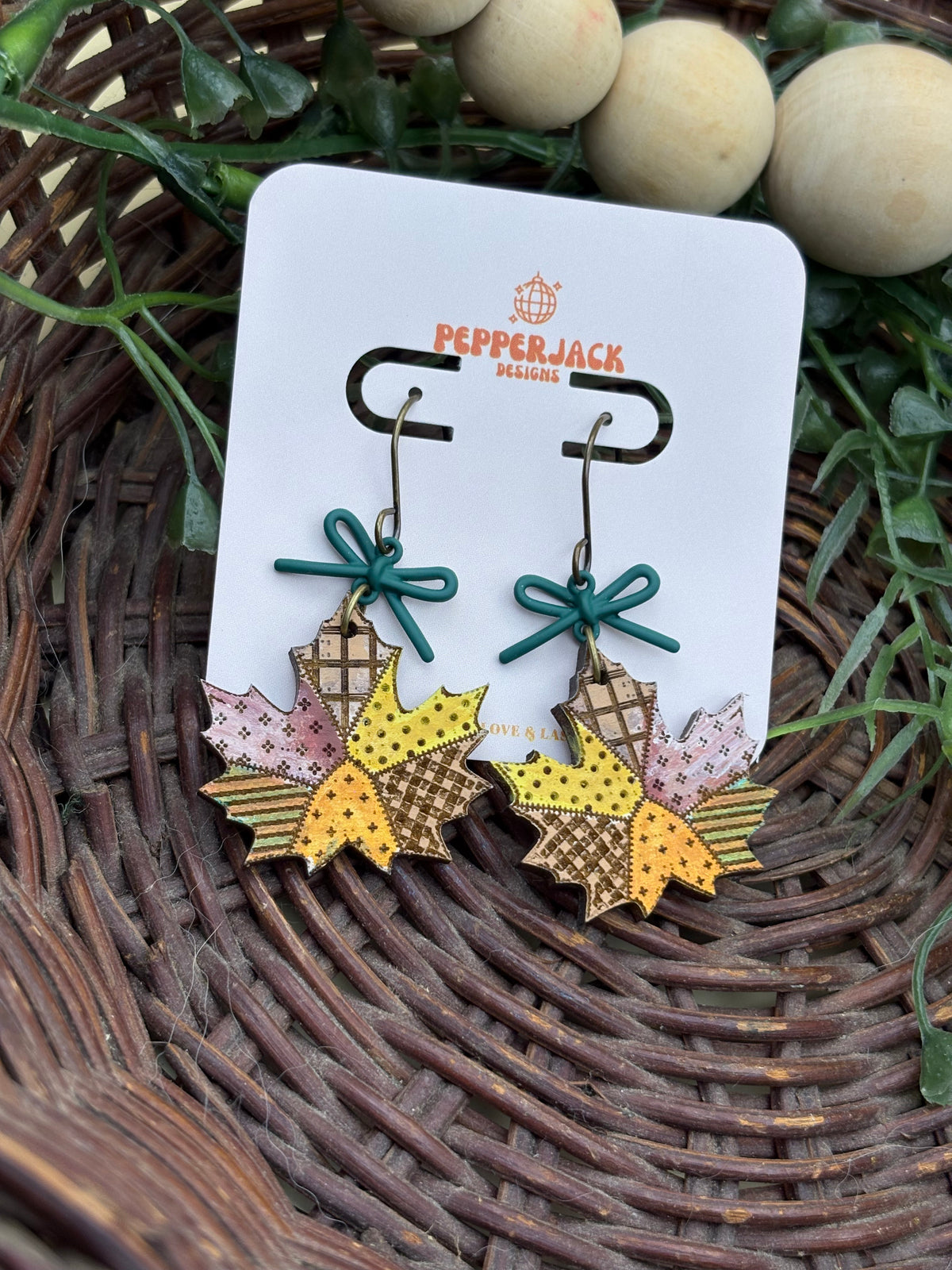 Hand Painted Fall Leaf Earrings | Wooden Autumn Dangle Earrings | Patchwork Maple Leaves with Teal Bows