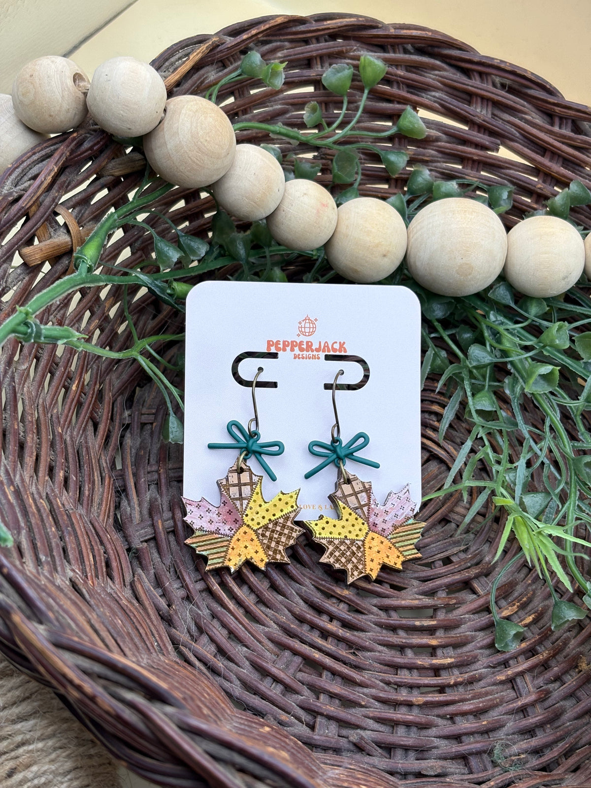 Hand Painted Fall Leaf Earrings | Wooden Autumn Dangle Earrings | Patchwork Maple Leaves with Teal Bows